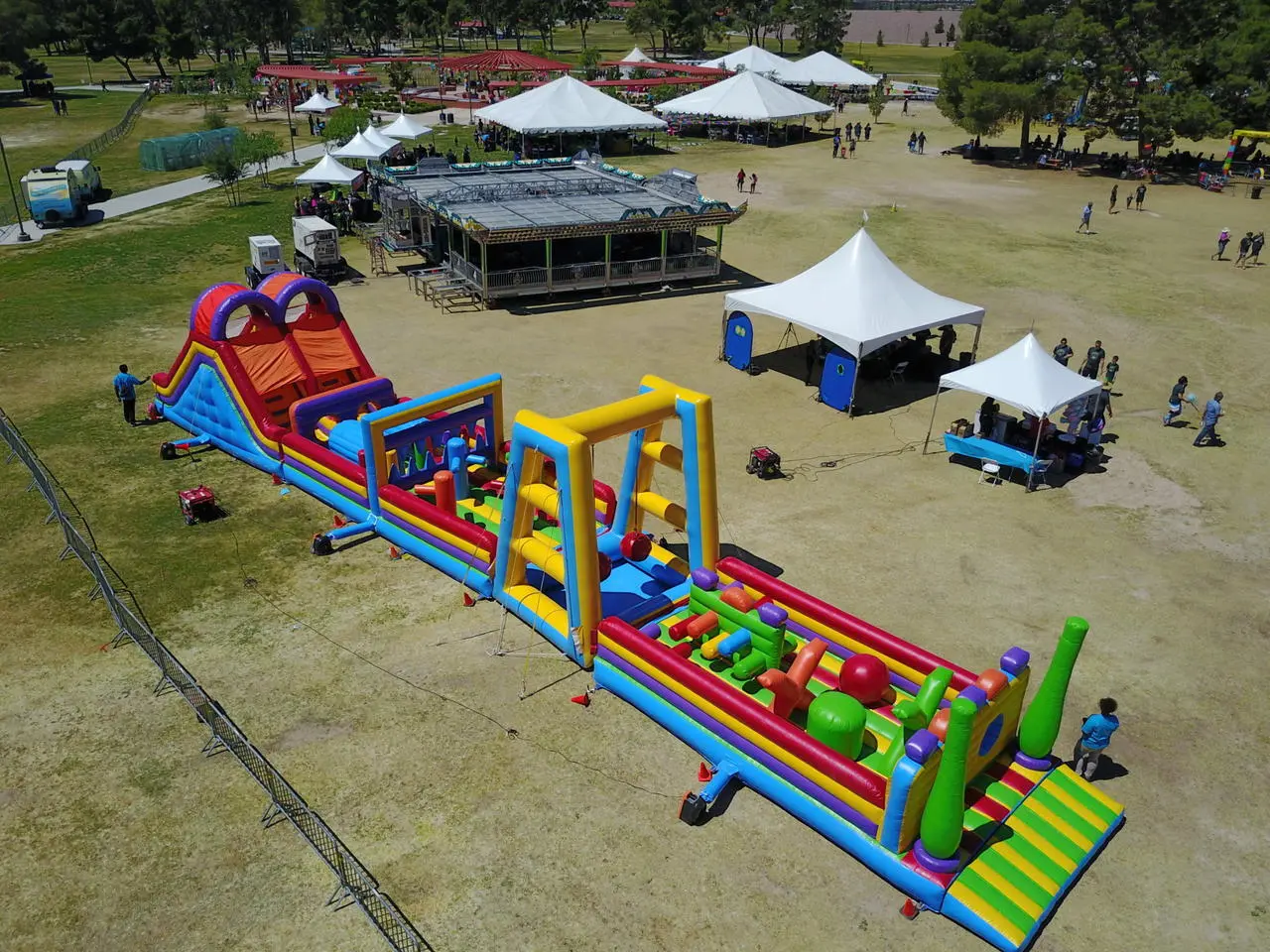 Aerial view large inflatable obstacle course multi colored slides tunnels for rent in Las Vegas