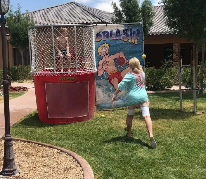 Dunk tank splash game woman throwing ball outdoor for rent in Las Vegas