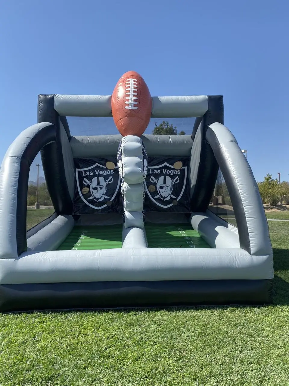 Raiders football toss game inflatable for rent in Las Vegas