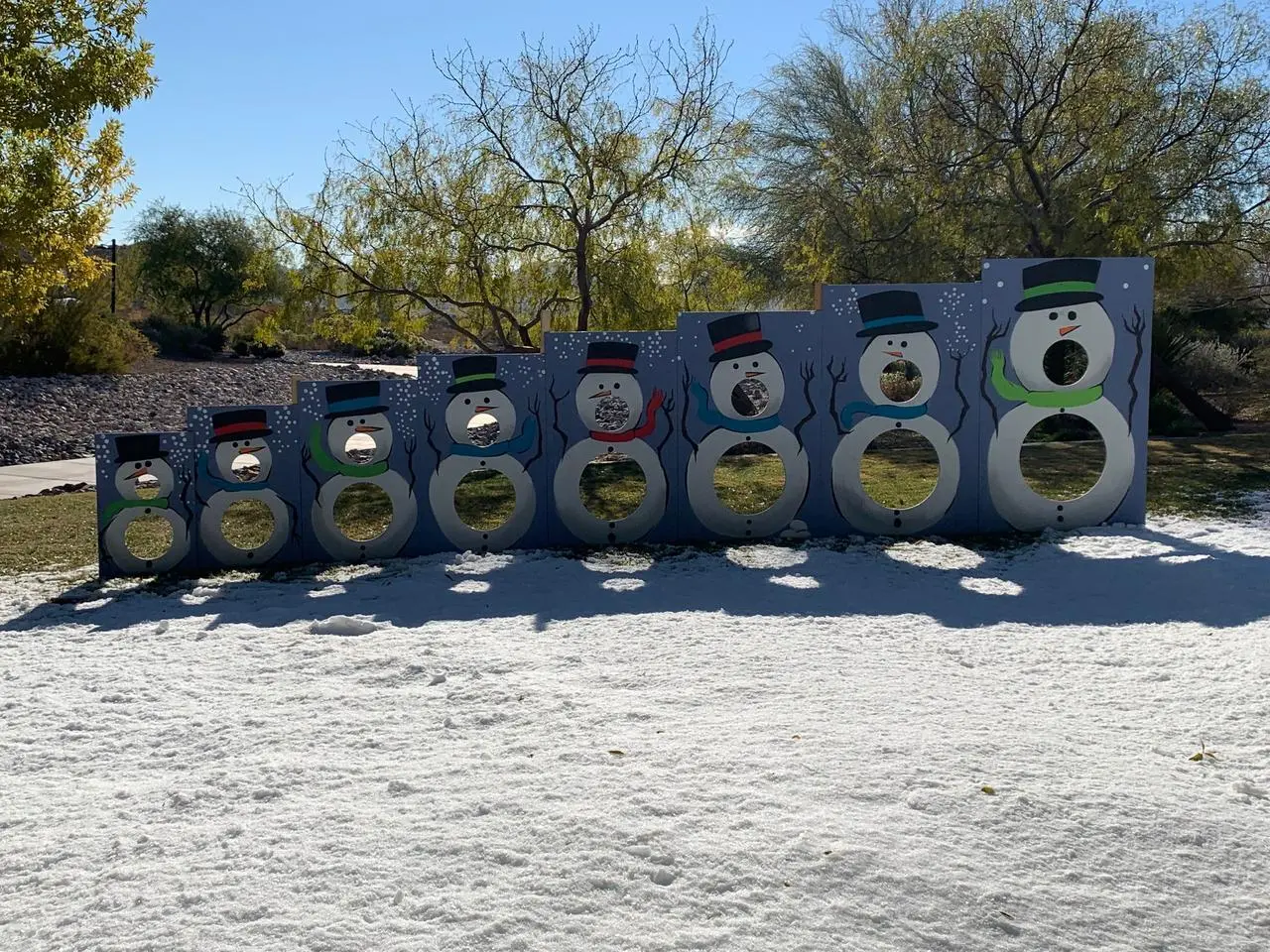 Snowman carnival game boards winter event target toss game production for rent in Las Vegas