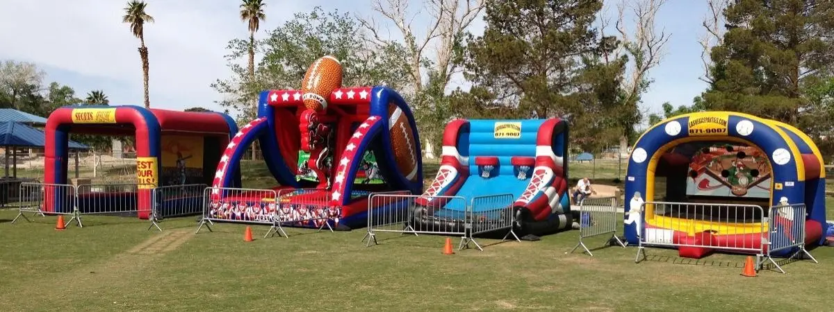 Sports themed inflatable attractions at an outdoor Las Vegas event