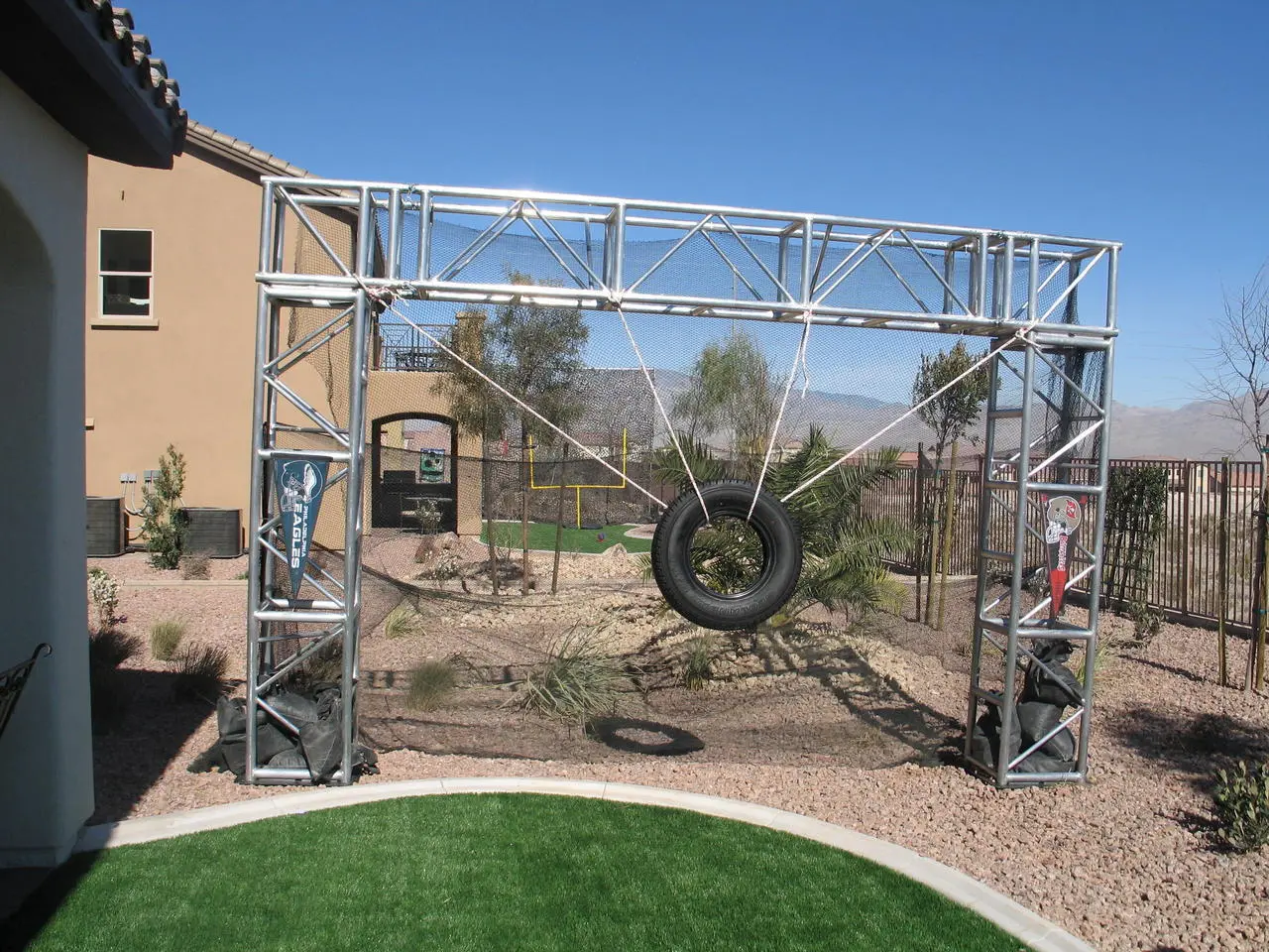 Tire swing silver truss structure eagles pennant outdoor for rent in Las Vegas