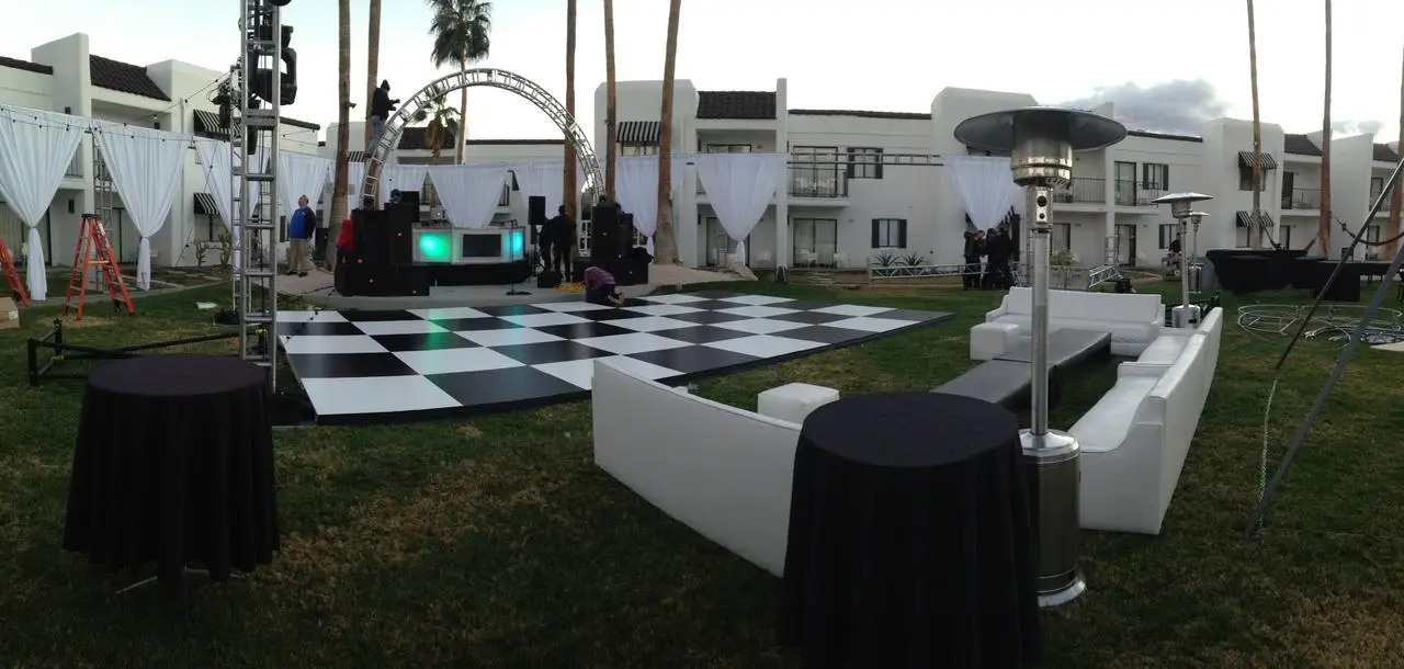 Outdoor resort checkerboard dance floor stage lounge seating for rent in Las Vegas