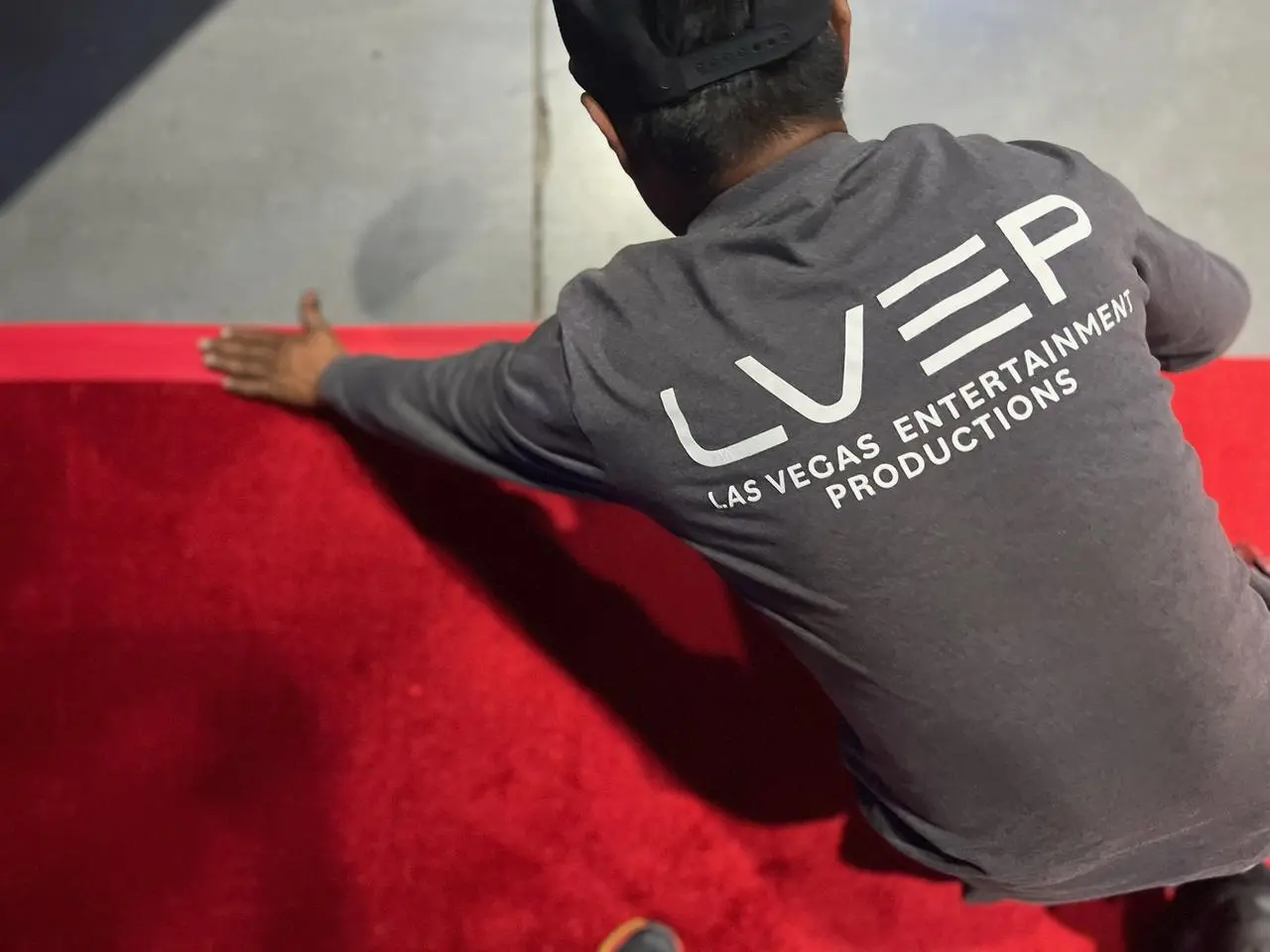 LVEP crew installing red carpet at a Las Vegas event