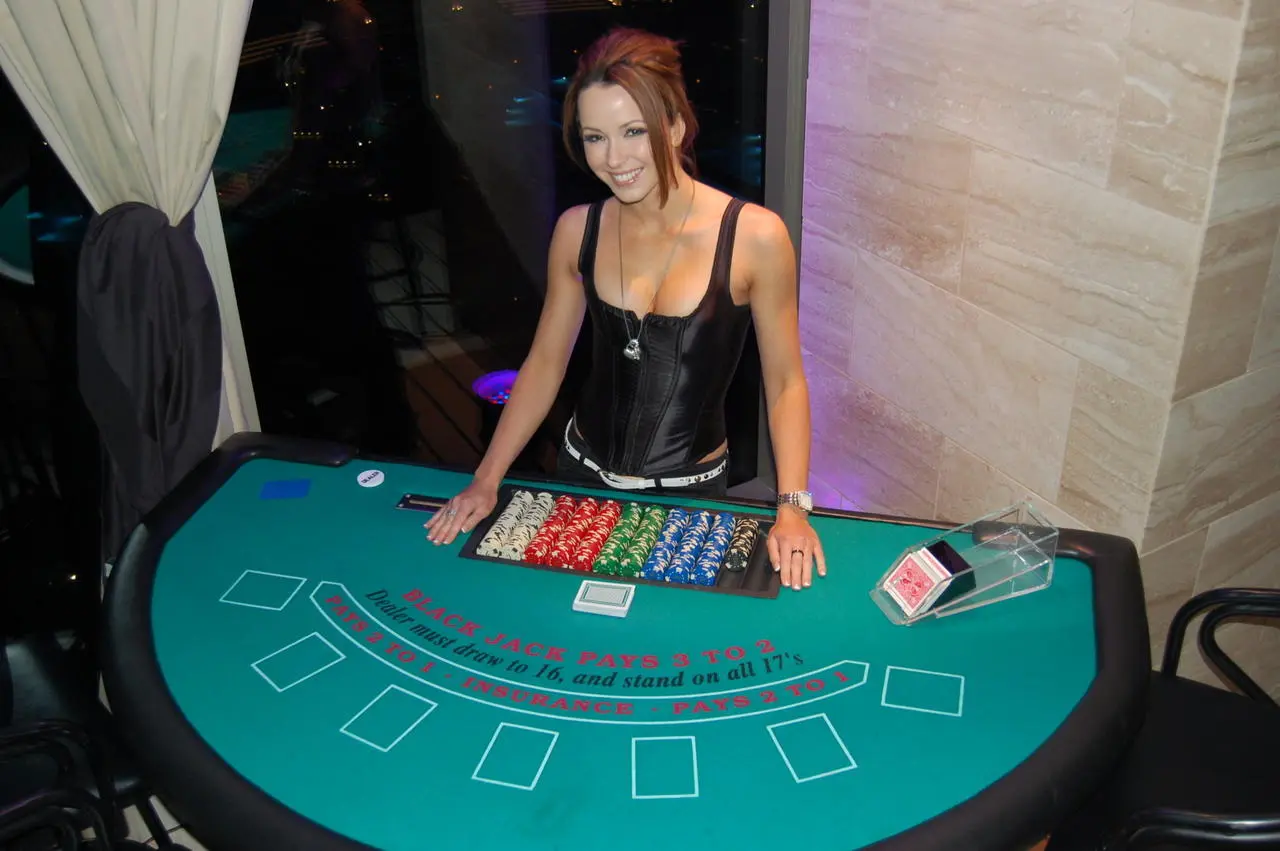 Corporate casino night blackjack table with a professional dealer