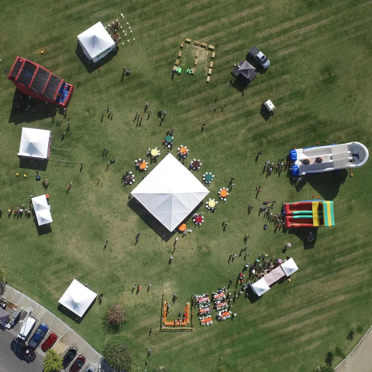 Aerial view company picnic tents inflatables tables dining area for rent in Las Vegas