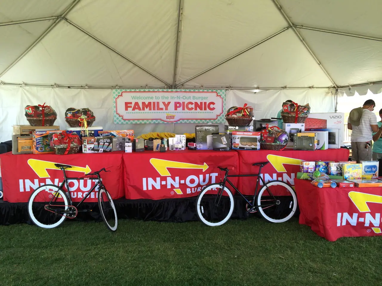 In-N-Out Burger family picnic prize display with bicycles and gift baskets