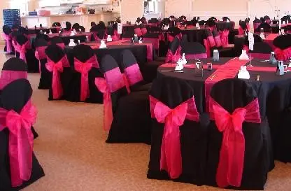 Formal event black chairs hot pink sashes elegant dining for rent in Las Vegas
