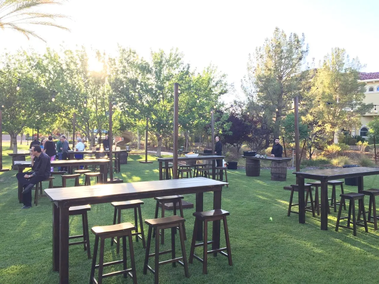 Outdoor event dark brown high top tables bar stools for rent in Las Vegas