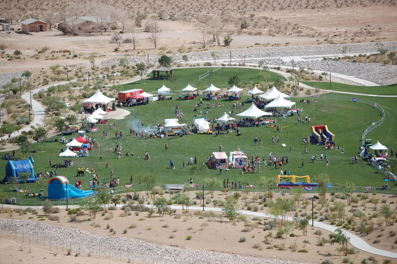 Aerial view outdoor community fair tents inflatables food trucks for rent in Las Vegas