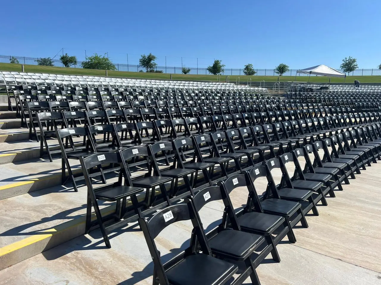 Outdoor event venue seating rows folding chairs for rent in Las Vegas