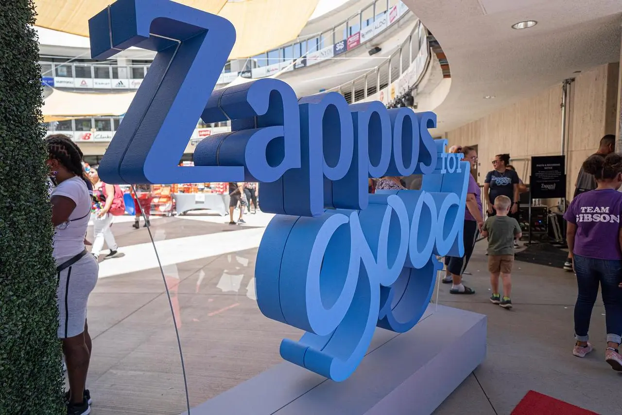 Zappos for Good outdoor event branding on a stadium plaza