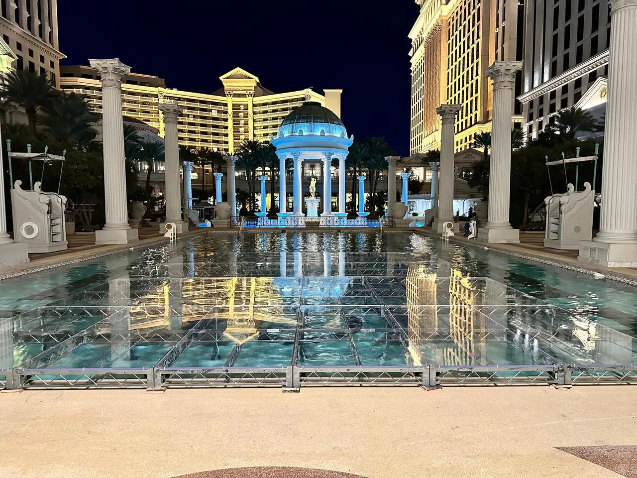 Transparent stage over a luxury resort pool