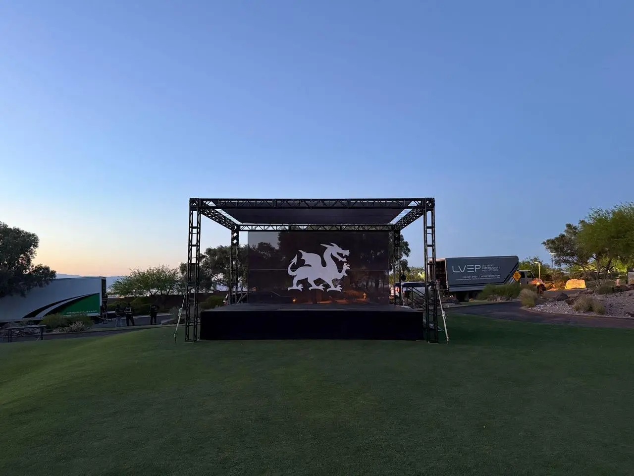 Outdoor event stage with an LED screen and truss structure