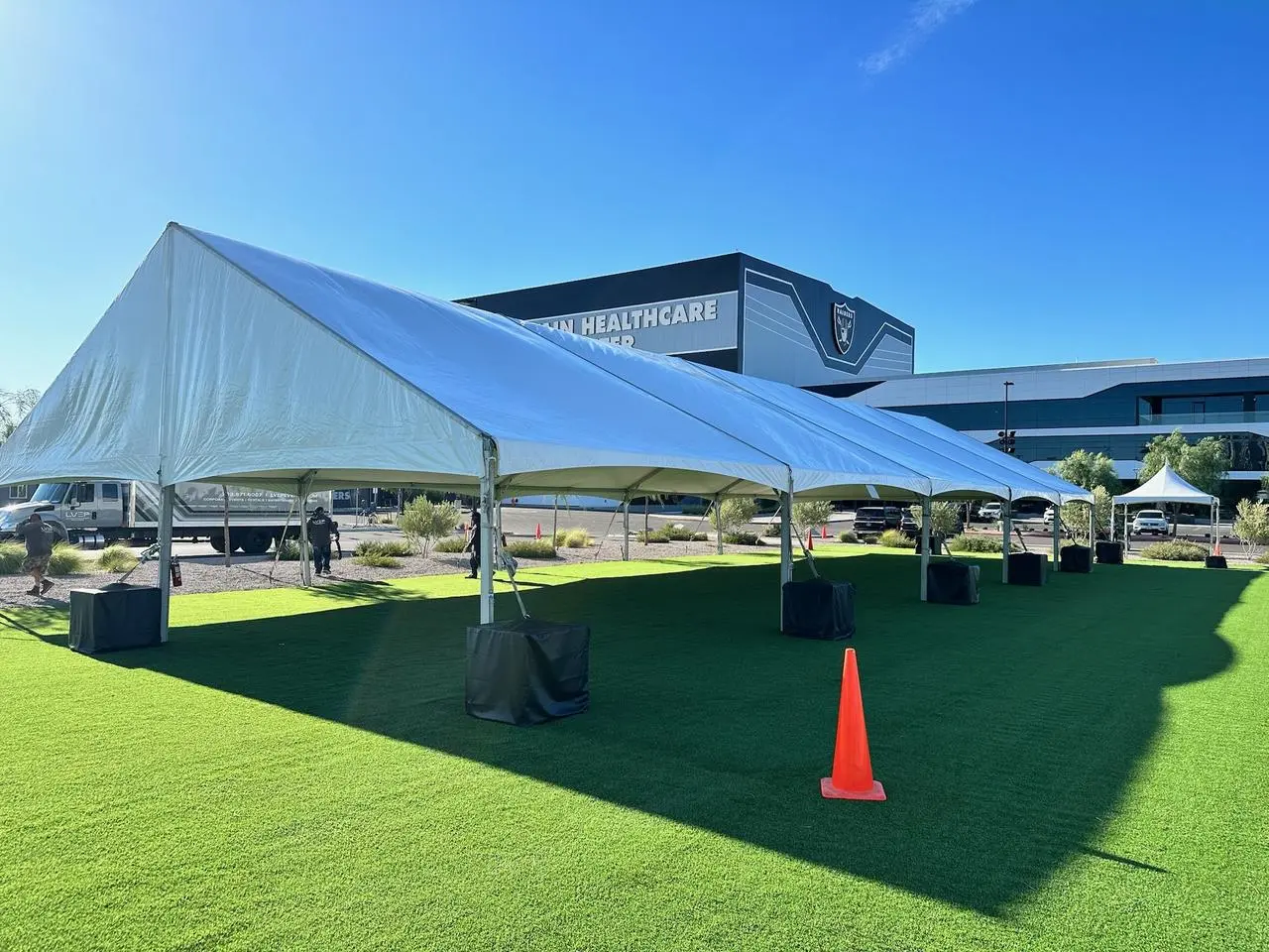 Large clear span tent artificial turf professional installation for rent in Las Vegas