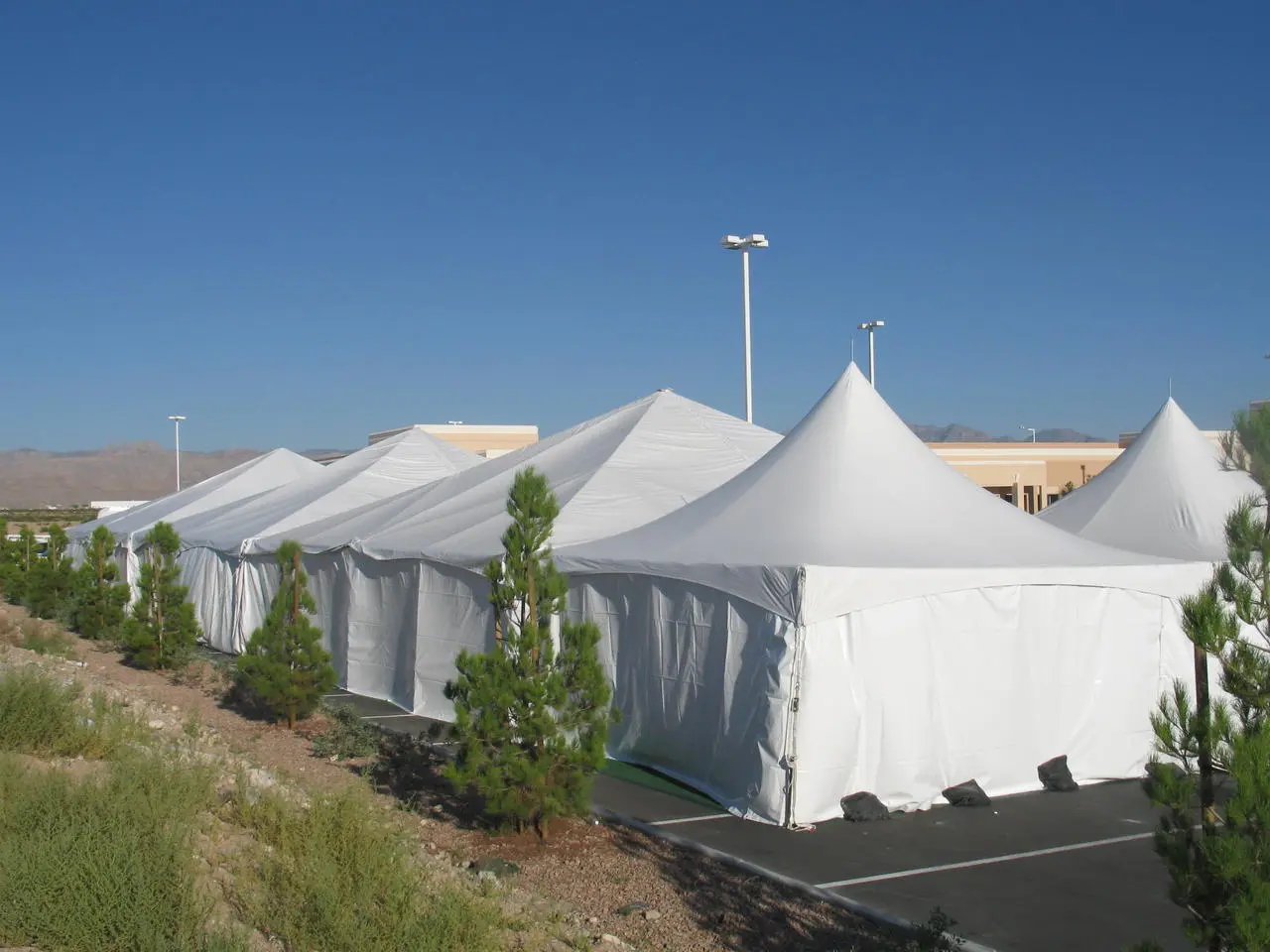 Row small pagoda tents vendor booths outdoor event for rent in Las Vegas