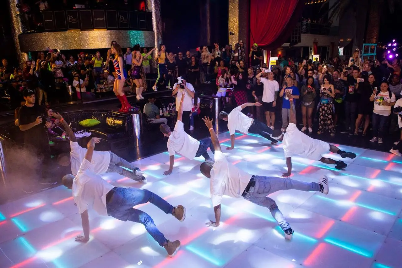 Breakdancers led dance floor female performer stage crowd concert event for rent in Las Vegas