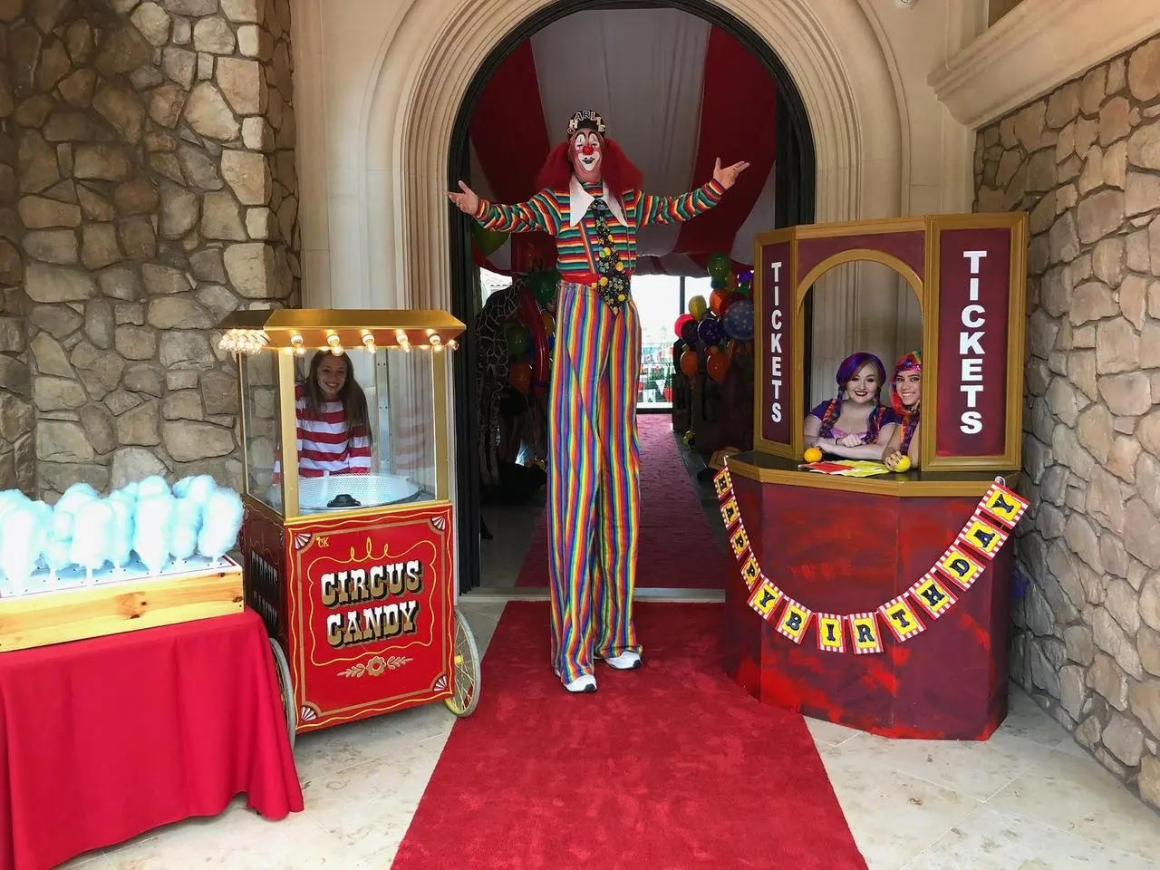 Circus themed event stilt walking clown cotton candy ticket booth for rent in Las Vegas