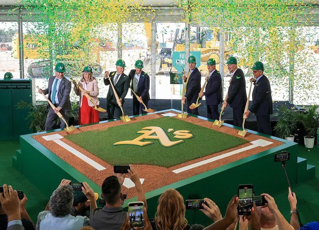Oakland athletics baseball groundbreaking ceremony golden shovels green hard hats for rent in Las Vegas