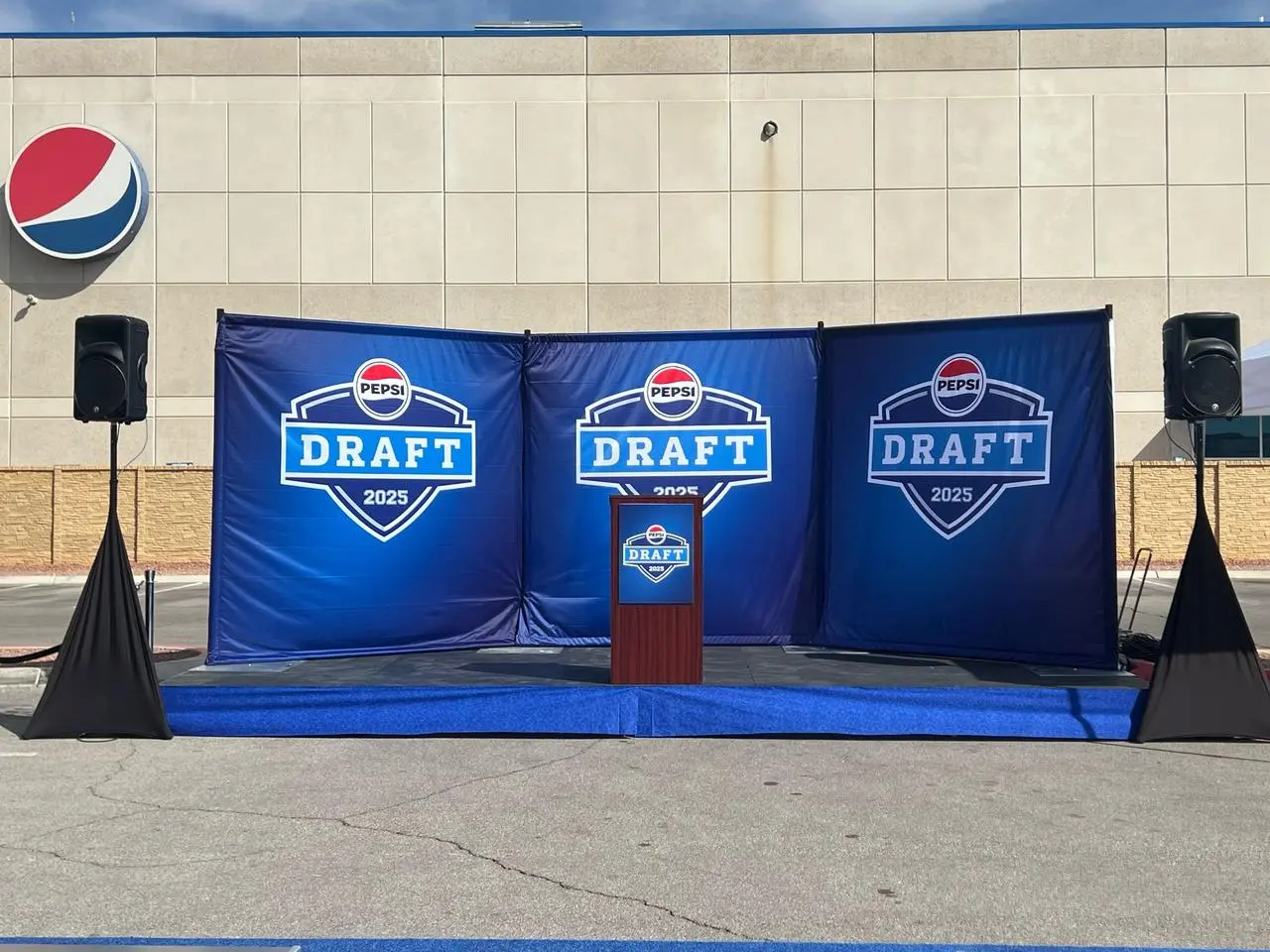 Pepsi draft 2025 branded backdrop stage podium for rent in Las Vegas