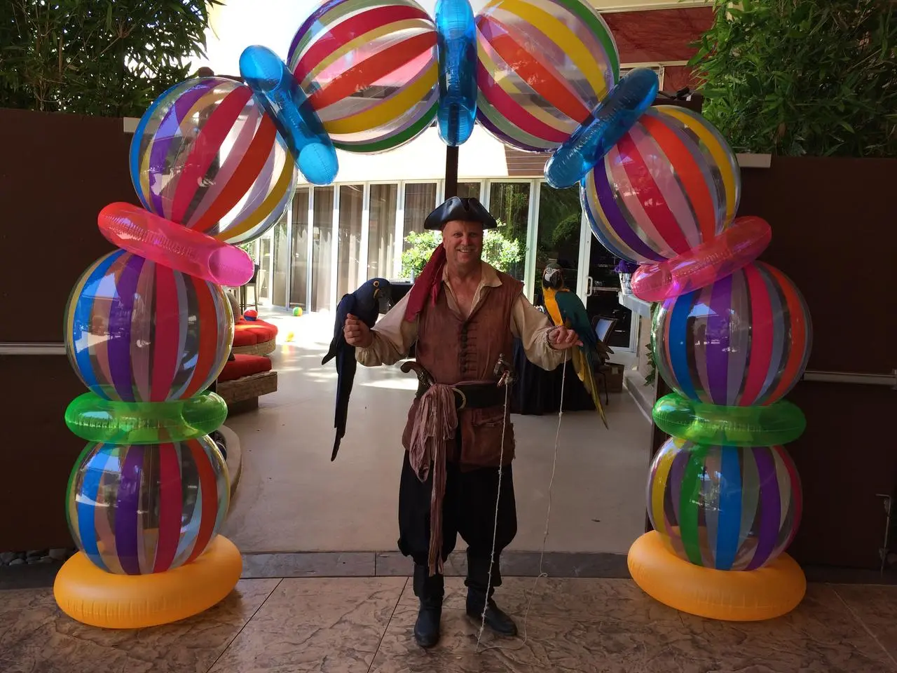 Pirate character macaw birds colorful inflatable arch beach balls event for rent in Las Vegas
