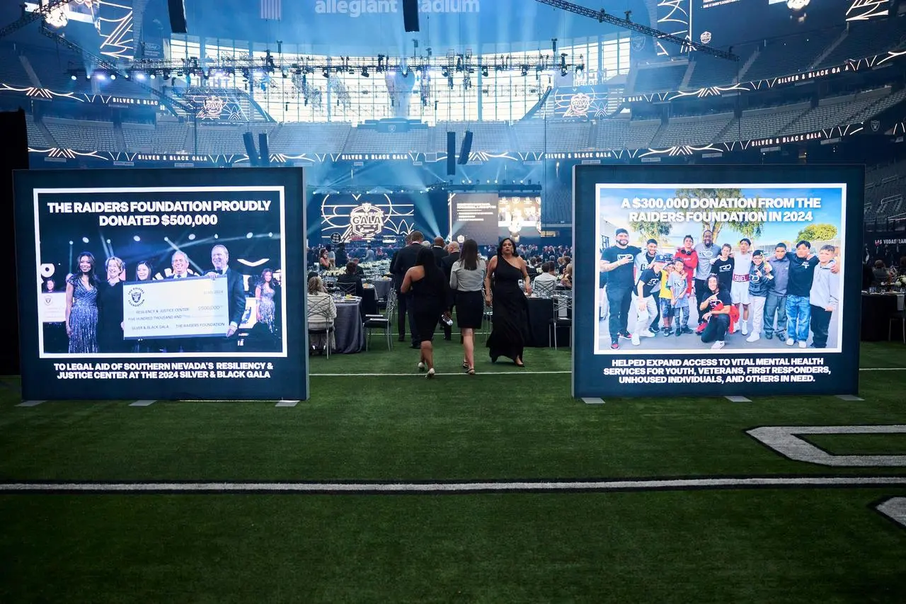 Raiders foundation charity donations display boards silver black gala stadium for rent in Las Vegas
