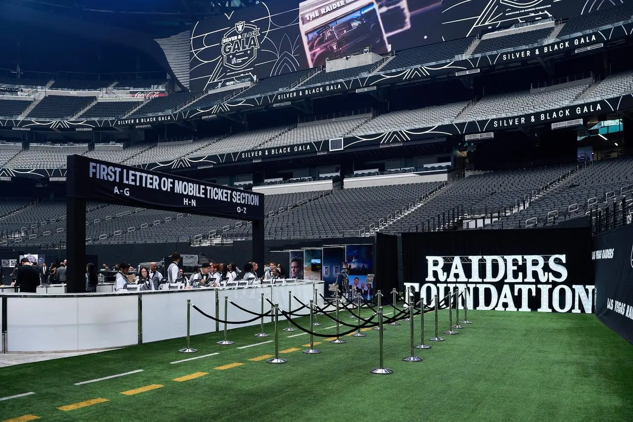 Raiders foundation silver black gala stadium registration turf field event for rent in Las Vegas