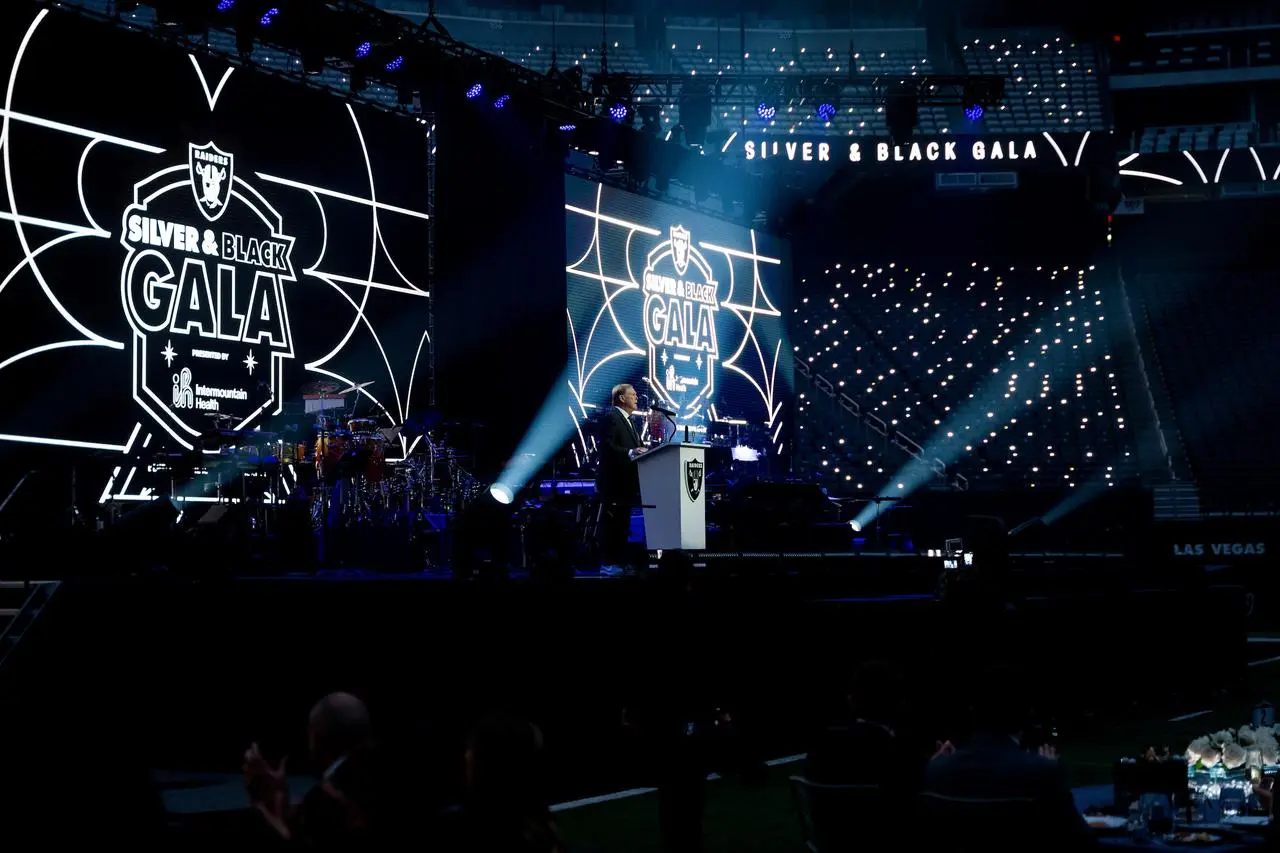 Raiders silver black gala speaker podium led screens stadium event for rent in Las Vegas