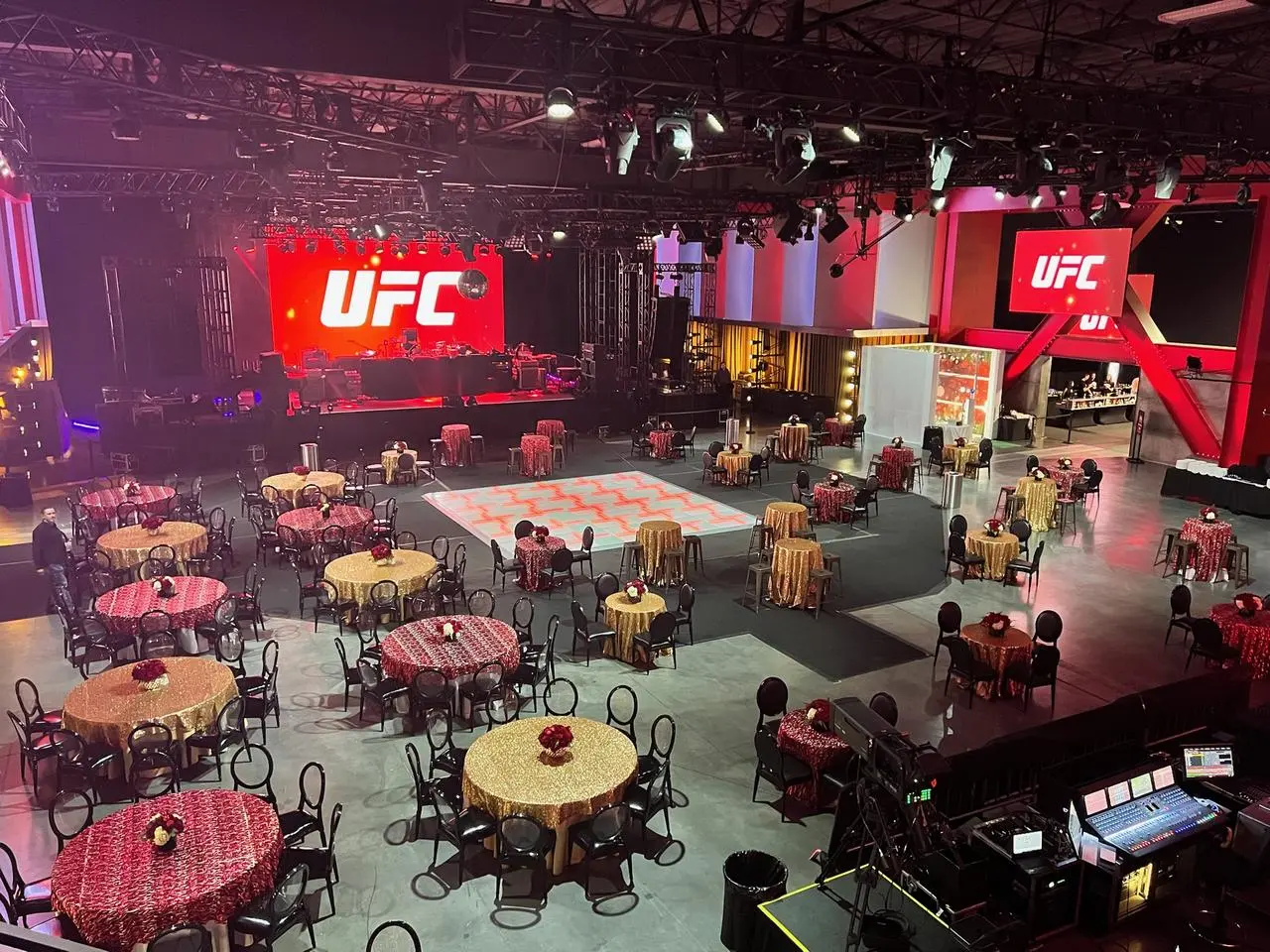 Ufc corporate gala event gold red tablecloths led screens dance floor for rent in Las Vegas