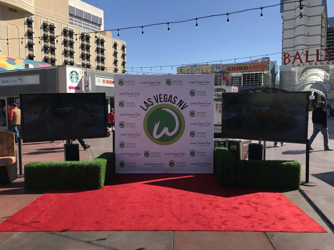 Wahlburgers grand bazaar shops branded backdrop red carpet outdoor event for rent in Las Vegas